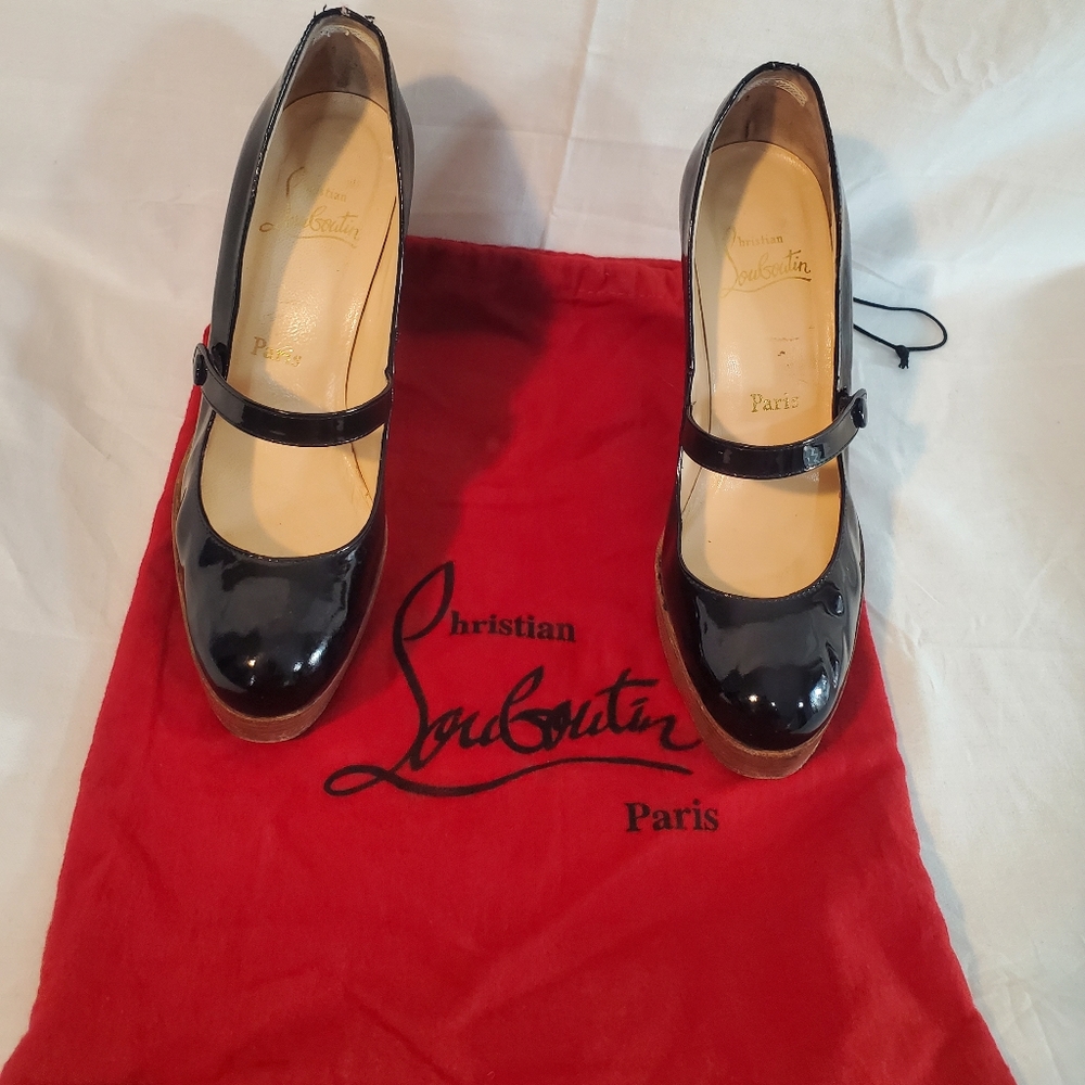 Christian Louboutin Women's EU 38/ 7.5 US Black Patent Leather Closed Toe Wedge.